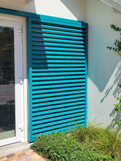 Custom teal gliding shutter