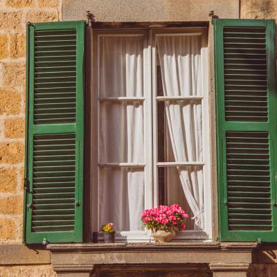 Outdoor Bahama Shutters: Combining Beauty and Protection